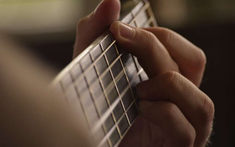 Gitarrensaiten Haende